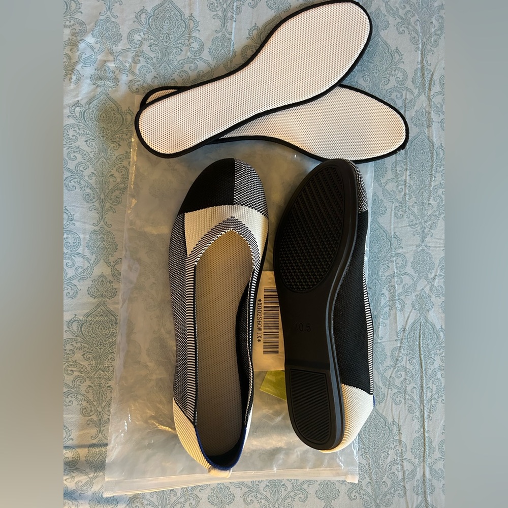 Size 10 black/tan flats, never worn, with additional inserts